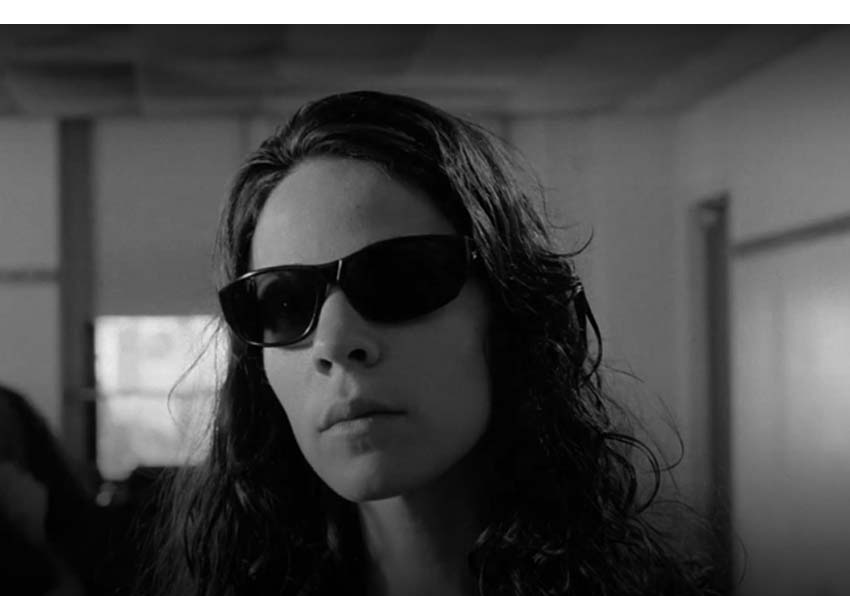 event image:A woman wearing black sunglasses